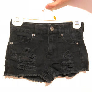 Black mid-rise ripped shorts
